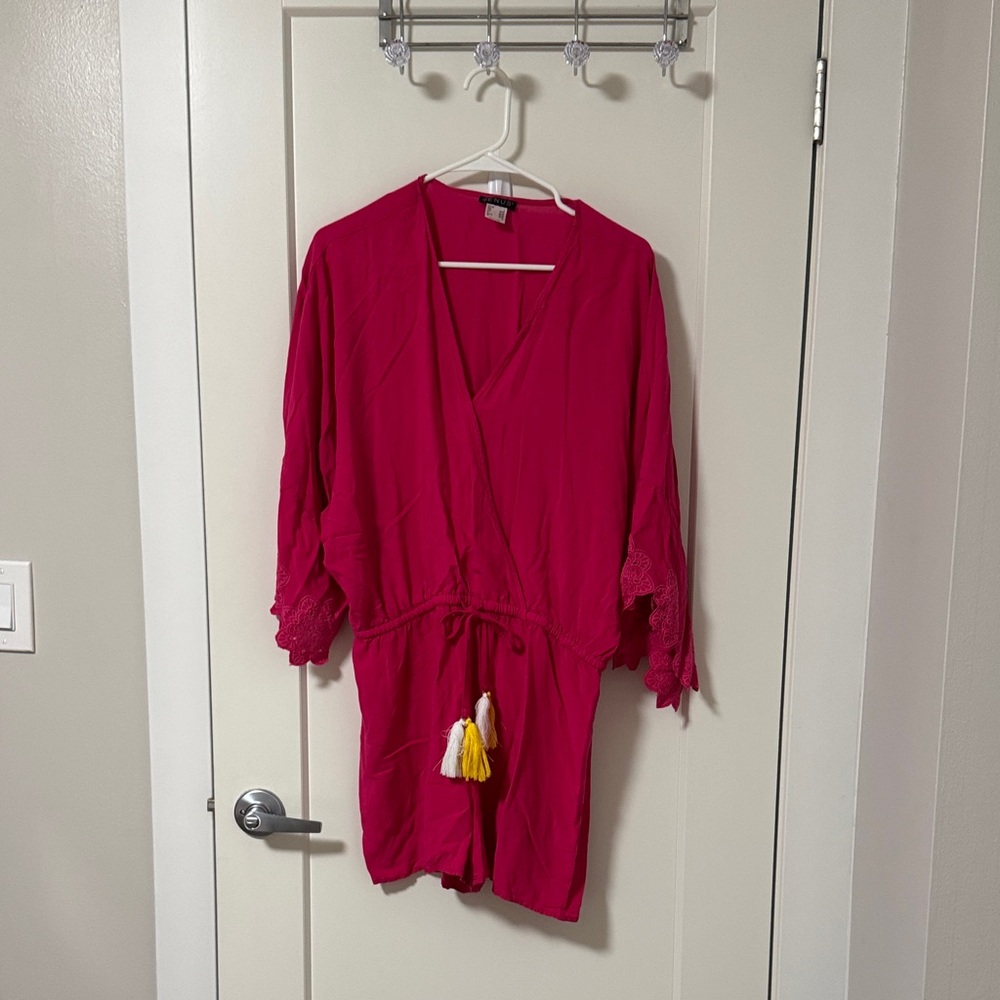NWOT Cute Pink Women's Romper with Tassel Accents and Scalloped Sleeves